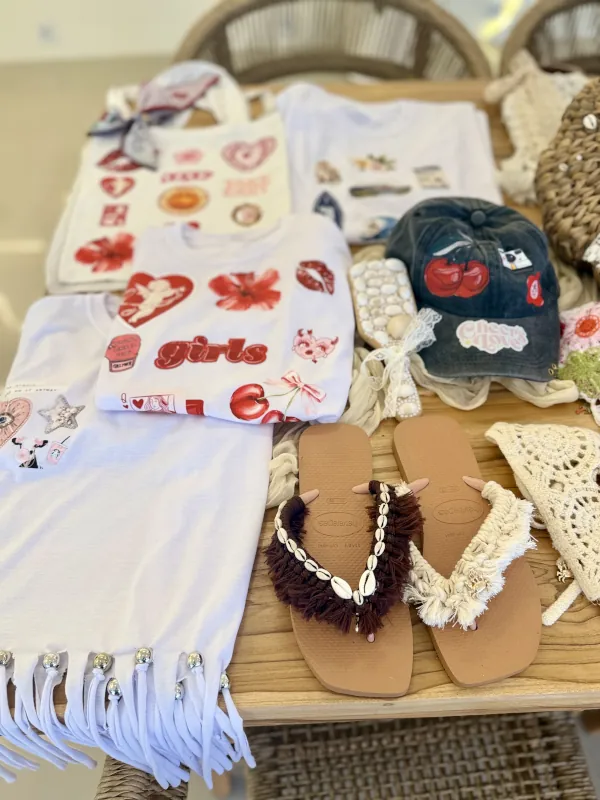 Shell-decorated macrame flip-flops and personalised accessories on the Luma Numa studio table